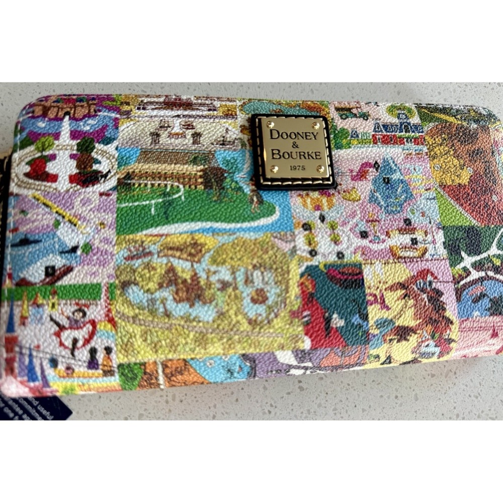 2026 Disney Parks Dooney & Bourke Vintage Park Maps & Icons Wristlet Wallet New